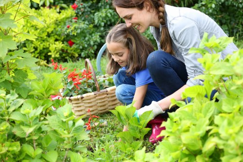 Lee gardeners working with seasonal planting and lawn care