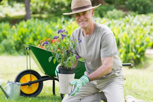 Healthy soil, mulch, and planting support in garden maintenance in Lee